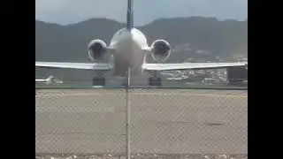 San Maarten Tom Millar Kicked off by a MD80 Airplane tacking off the airport