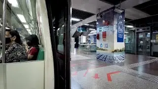 Singapore MRT ride from City Hall to Raffles Place train station