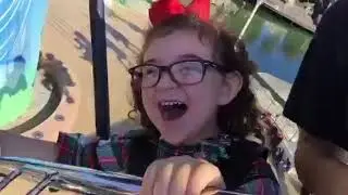 Tessa's 1st time on the swings at Disneyland