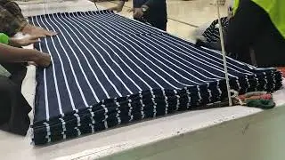Yarn dyeing stripe fabric cutting. Means style t-shirt cutting, Sleeve cutting,