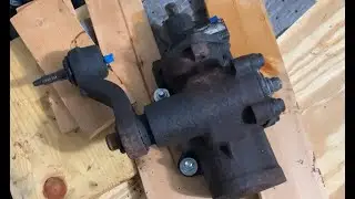 Pitman arm nut loosening.