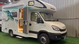 BYD Luxurious Outdoor Travel and Camping Caravan RV With Smart Bed, Table, Freeze, Toilet & Kitchen