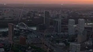 Aerial views highlight the Bratislava skyline, showcasing the Danube River and Apollo Bridge, all