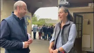 John Blake chats to Longborough Primary's Fran Regan during National Racehorse Week