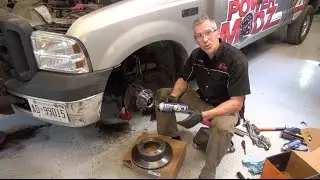 Замена ступицы переднего колеса и установка тормозов на Ford F350. PowerModz!