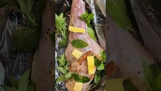 A leg of wild goat going into the oven to slow roast. #shorts