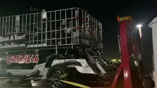 Towing a huge shopping cart with a flatbed tow truck - Chevy Tahoe frame 