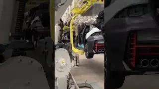 Conveyor assembly of automobiles by robots #robot #robotics #machine