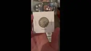 showing my collection of 2010 Vancouver olympic coins and a 1967 bobcat quarter