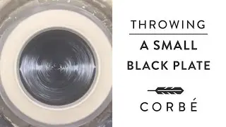 Throwing a Small Black Plate on the Pottery Wheel