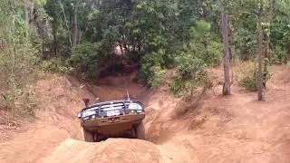 VW Amarok towing a camper trailer out of Palm Creek, Cape York