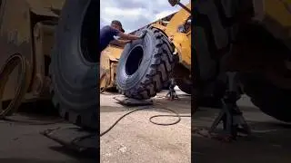 Changing a Loader's tire complete video.