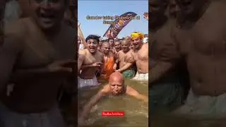 Gurudev Taking shahi Snan at Sangam 🧡 #gurudev #lokanathswami#prayagraj #kumbhmela#mahakumbh #sangam