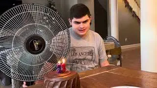 I blow out the candles with a FAN on my 23rd birthday