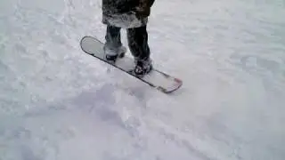 Snowboarding on golf course