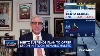Hertz suspends plan to offer $500 million in stock