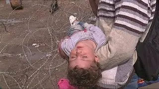 Macedonia refugee emergency: thousands run across border