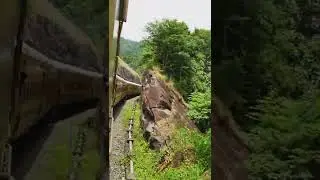 Amazing technology of train curving between two rocks in a Jungle...😱