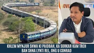 KHLEM MYNJUR SHWA KI PAIDBAH, KA SORKAR KAM TREH BAN SHNA LYNTI REL, ONG U CONRAD