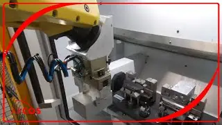 Sistema robotizzato per l&rsquo;asservimento ad una macchina utensile
