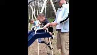 Toddler falls off slide