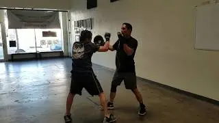 JKD training keeps you young.  Straight lead interception to shoulder block to cross hook cross.
