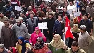 NC activists protest against harassment of Kashmiris