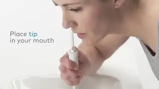 Waterpik Cordless Freedom Pro White - Available Now at Shaver Shop