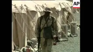 Various of US and UK troops in desert