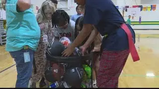 American Heart Association donates balls to local school