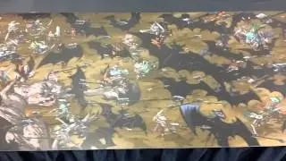 Bryan Glass unfurling the Mice Templar poster