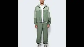 Sporty Elegance: THOM BROWNE Oversized Zip Up Track Jacket