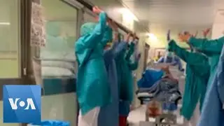 Staff Cheers as Virus Patient Leaves ICU in Spain