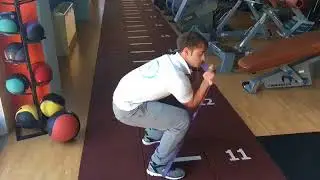 Squat + military press con elastico