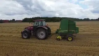 Case IH XMX175 and John Deere baler