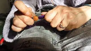 Attaching the guru bead.