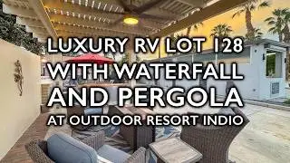 Enjoy waterfall ambiance on private RV lot #128 with pergola, outdoor kitchen, custom pet area,.