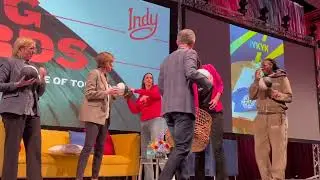 Caitlin Clark launches mini basketball inside ballroom