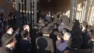 Mourners carry body of teenage boy&nbsp;killed by bus at Jerusalem ultra-Orthodox protest