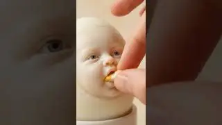 A hyper-realistic, close-up macro photo of a hard-boiled egg with a tiny, expressive human baby face