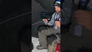 Using lights to attract crappies under the ice at night.