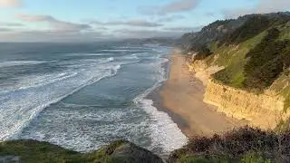 Clifftop views over a ocean and a beautiful sunset with relaxing music