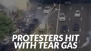 Tear gas deployed after protesters block Vine Street Expressway in Philadelphia