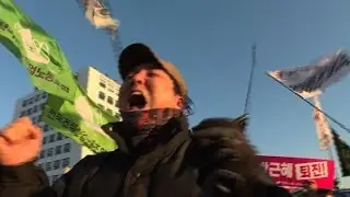 South Koreans celebrate after President Park impeached