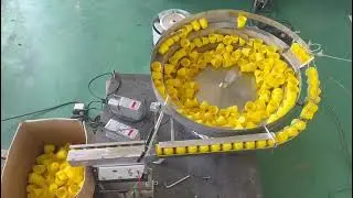 Bottle cap vibration bowl feeder for filling machine line, with the opening facing down