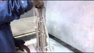 Ceramic shell slurry & first fused silica coat.