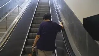 Philippines, Metro Manila, Paseo de Roxas underpass, 1X escalator
