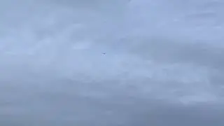 QantasLink Embraer E190AR Flies Over Neighbourhood