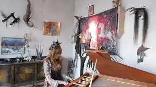 Efvi playing the harpsichord for Wolfi