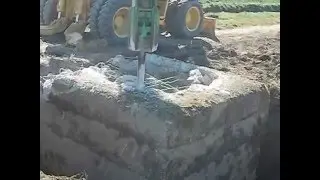 komatsu PW 95 con martello montabert 125 XS